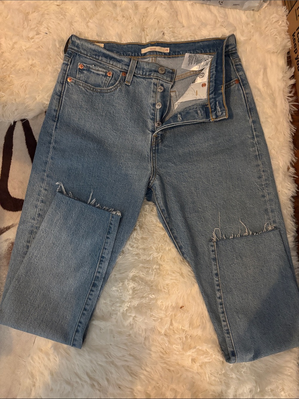 Levi's Wedgie High Rise Light Blue Straight-Leg Jeans with Raw Hem W29